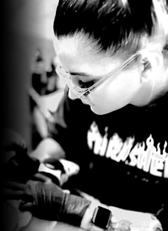 Paige Green tattooing a client at Iron Mayhem Ink, Tuggerah
